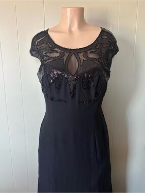 Elegant Black Beaded Prom Dress with Sheer Yoke